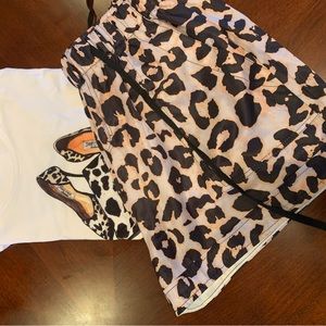 Leopard print Shorts and T shirt. Size XL but fits like a large.